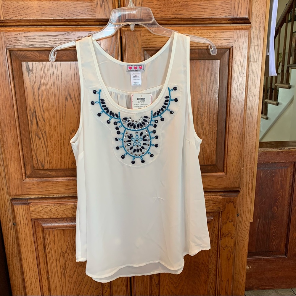 White tank top with embroidered top by Three Pink Hearts.